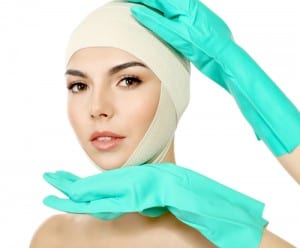 Young beautiful woman with an elastic bandage on her head