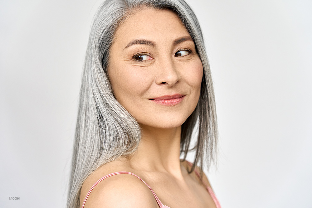 Mature woman with gray hair